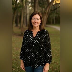 Abbeline Size small women’s black with gold design V-neck blouse